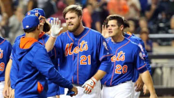 Sep 27, 2014; New York, NY, USA; New York Mets first baseman Lucas Duda (21) and teammates celebrate his two run walk off home run during the ninth inning against the Houston Astros at Citi Field. New York Mets won 2-1. Mandatory Credit: Anthony Gruppuso-USA TODAY Sports