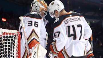 VANCOUVER, BC - MARCH 26: John Gibson #36 of the Anaheim Ducks is congratulated by teammate Hampus Lindholm #47 during their NHL game against the Vancouver Canucks at Rogers Arena March 26, 2019 in Vancouver, British Columbia, Canada. (Photo by Jeff Vinnick/NHLI via Getty Images)"n