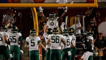 AMES, IA - NOVEMBER 7: Wide receiver R.J. Sneed #0 of the Baylor Bears celebrates with teammates after scoring a touchdown in the first half of the play against the Iowa State Cyclones at Jack Trice Stadium on November 7, 2020 in Ames, Iowa. (Photo by David Purdy/Getty Images)