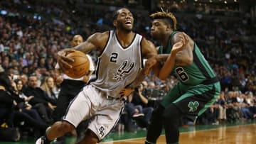 Nov 25, 2016; Boston, MA, USA; San Antonio Spurs forward Kawhi Leonard (2) tries to get past Boston Celtics guard Marcus Smart (36) during the second half of the San Antonio Spurs 109-103 win over the Boston Celtics at TD Garden. Mandatory Credit: Winslow Townson-USA TODAY Sports