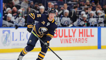 BUFFALO, NY - FEBRUARY 23: Rasmus Dahlin #26 of the Buffalo Sabres looks to make a pass during the second period against the Winnipeg Jets at KeyBank Center on February 23, 2020 in Buffalo, New York. (Photo by Timothy T Ludwig/Getty Images)