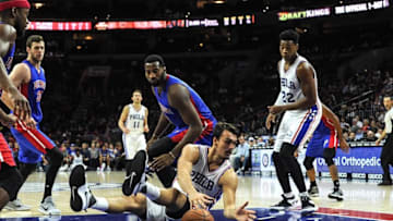Oct 15, 2016; Philadelphia, PA, USA; Philadelphia 76ers forward Dario Saric (9) grabs a loose ball during the fourth quarter of the preseason game against the Detroit Pistons at the Wells Fargo Center.The Pistons won 97-76. Mandatory Credit: John Geliebter-USA TODAY Sports
