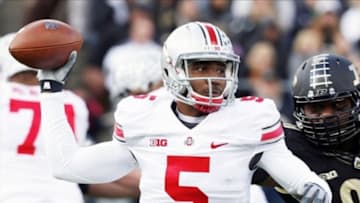 Nov 2, 2013; West Lafayette, IN, USA; Ohio State Buckeyes quarterback Braxton Miller (5) throws a pass against the Purdue Boilermakers at Ross Ade Stadium. Mandatory Credit: Brian Spurlock-USA TODAY Sports