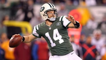 Nov 27, 2016; East Rutherford, NJ, USA; New York Jets quarterback Ryan Fitzpatrick (14) throws the ball against the New England Patriots during the first quarter at MetLife Stadium. Mandatory Credit: Brad Penner-USA TODAY Sports