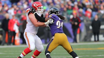 Dec 20, 2015; Baltimore, MD, USA; Baltimore Ravens ZaDarius Smith (90) is blocked by Kansas City Chiefs tackle Eric Fisher (72) at M&T Bank Stadium. Mandatory Credit: Mitch Stringer-USA TODAY Sports