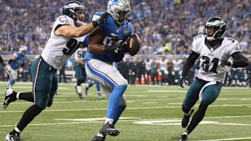 DETROIT MI - NOVEMBER 26: Wide receiver Calvin Johnson #81 of the Detroit Lions drops a first quarter pass while being defended by Byron Maxwell #31 and outside linebacker Connor Barwin #98 of the Philadelphia Eagles on November 26, 2015 at Ford Field in Detroit, Michigan. (Photo by Leon Halip/Getty Images)