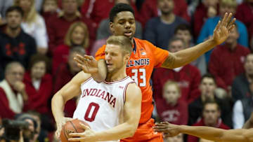 Jan 19, 2016; Bloomington, IN, USA; Indiana Hoosiers forward Max Bielfeldt (0) is fouled by Illinois Fighting Illini forward Mike Thorne Jr. (33) in the second half of the game at Assembly Hall. The Indiana Hoosiers beat the Illinois Fighting Illini by the score of 103-69. Mandatory Credit: Trevor Ruszkowski-USA TODAY Sports