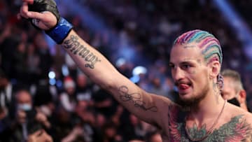 LAS VEGAS, NEVADA - DECEMBER 11: Sean O'Malley celebrates his knockout victory over Raulian Paiva of Brazil in their bantamweight fight during the UFC 269 event at T-Mobile Arena on December 11, 2021 in Las Vegas, Nevada. (Photo by Carmen Mandato/Getty Images)