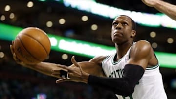 Jan 24, 2014; Boston, MA, USA; Boston Celtics point guard Rajon Rondo (9) shoots the ball against the Oklahoma City Thunder during the second half at TD Garden. Mandatory Credit: Mark L. Baer-USA TODAY Sports