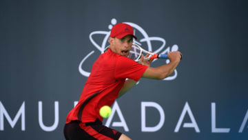 ABU DHABI, UNITED ARAB EMIRATES - DECEMBER 30: Dominic Thiem of Austria plays a backhand during his match against Pablo Carreno Busta of Spain on day three of the Mubadala World Tennis Championship at International Tennis Centre Zayed Sports City on December 30, 2017 in Abu Dhabi, United Arab Emirates. (Photo by Tom Dulat/Getty Images)