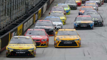 Aug 21, 2016; Bristol, TN, USA; NASCAR Sprint Cup Series driver Carl Edwards (19) leads a restart during a rain delayed Bass Pro Shops NRA Night Race at Bristol Motor Speedway. Mandatory Credit: Randy Sartin-USA TODAY Sports