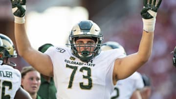 FAYETTEVILLE, AR - SEPTEMBER 14: Nouredin Nouili #73 of the Colorado State Rams signals it is the fourth quarter during a game against the Arkansas Razorbacks at Razorback Stadium on September 14, 2019 in Fayetteville, Arkansas. The Razorbacks defeated the Rams 55-34. (Photo by Wesley Hitt/Getty Images)