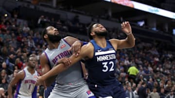 MINNEAPOLIS, MN - DECEMBER 19: Andre Drummond #0 of the Detroit Pistons and Karl-Anthony Towns #32 of the Minnesota Timberwolves fight for position during the game on December 19, 2018 at Target Center in Minneapolis, Minnesota. NOTE TO USER: User expressly acknowledges and agrees that, by downloading and/or using this photograph, user is consenting to the terms and conditions of the Getty Images License Agreement. Mandatory Copyright Notice: Copyright 2018 NBAE (Photo by Jordan Johnson/NBAE via Getty Images)