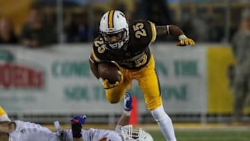 Oct 29, 2016; Laramie, WY, USA; Wyoming Cowboys wide receiver Austin Conway (25) runs against the Boise State Broncos during the fourth quarter at War Memorial Stadium. The Cowboys beat the Broncos 30-28. Mandatory Credit: Troy Babbitt-USA TODAY Sports