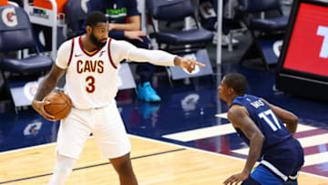 MINNEAPOLIS, MN - JANUARY 31: Andre Drummond #3 of the Cleveland Cavaliers looks to pass the ball as Ed Davis #17 of the Minnesota Timberwolves guards him during the third quarter at Target Center on January 31, 2021 in Minneapolis, Minnesota. NOTE TO USER: User expressly acknowledges and agrees that, by downloading and or using this photograph, User is consenting to the terms and conditions of the Getty Images License Agreement. (Photo by Harrison Barden/Getty Images)