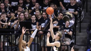 WEST LAFAYETTE, INDIANA - FEBRUARY 01: Fletcher Loyer #2 of the Purdue Boilermakers takes a shot over Caleb Dorsey #4 of the Penn State Nittany Lions during the first half at Mackey Arena on February 01, 2023 in West Lafayette, Indiana. (Photo by Justin Casterline/Getty Images)