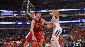 Mar 25, 2016; Chicago, IL, USA; Iowa State Cyclones forward Georges Niang (31) dribbles against Virginia Cavaliers forward Anthony Gill (13) during the second half in a semifinal game in the Midwest regional of the NCAA Tournament at United Center. Mandatory Credit: Dennis Wierzbicki-USA TODAY Sports