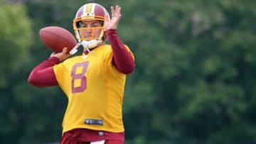Aug 6, 2013; Richmond, VA, USA; Washington Redskins quarterback Rex Grossman (8) throws the ball during afternoon practice as part of the 2013 NFL training camp at the Bon Secours Washington Redskins Training Center. Mandatory Credit: Geoff Burke-USA TODAY Sports