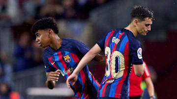 BARCELONA, SPAIN - APRIL 29: Lamine Yamal of FC Barcelona substitutes his teammate Pablo Paez 'Gavi' during the LaLiga Santander match between FC Barcelona and Real Betis at Spotify Camp Nou on April 29, 2023 in Barcelona, Spain. (Photo by Alex Caparros/Getty Images)