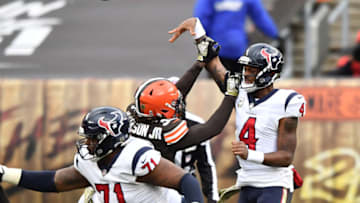 CLEVELAND, OHIO - NOVEMBER 15: Deshaun Watson #4 of the Houston Texans attempts a pass against the Cleveland Browns during the second half at FirstEnergy Stadium on November 15, 2020 in Cleveland, Ohio. (Photo by Jamie Sabau/Getty Images)