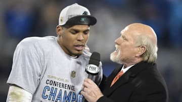 Jan 24, 2016; Charlotte, NC, USA; Fox sports broadcaster Terry Bradshaw interviews Carolina Panthers quarterback Cam Newton (1) after the NFC Championship football game against the Arizona Cardinals at Bank of America Stadium. The Panthers won 49-15. Mandatory Credit: John David Mercer-USA TODAY Sports