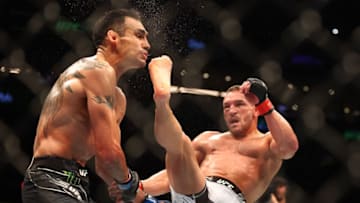 May 7, 2022; Phoenix, Arizona, USA; Michael Chandler kicks Tony Ferguson for the knockout during UFC 274 at Footprint Center. Mandatory Credit: Mark J. Rebilas-USA TODAY Sports