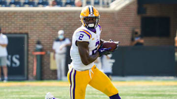 Oct 10, 2020; Columbia, Missouri, USA; LSU Tigers tight end Arik Gilbert (2) runs against the Missouri Tigers during the first half at Faurot Field at Memorial Stadium. Mandatory Credit: Jay Biggerstaff-USA TODAY Sports