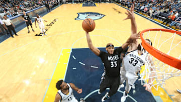 MEMPHIS, TN - NOVEMBER 19: Adreian Payne #33 of the Minnesota Timberwolves goes to the basket against the Memphis Grizzlies on November 19, 2016 at FedExForum in Memphis, Tennessee. NOTE TO USER: User expressly acknowledges and agrees that, by downloading and or using this photograph, User is consenting to the terms and conditions of the Getty Images License Agreement. Mandatory Copyright Notice: Copyright 2016 NBAE (Photo by Joe Murphy/NBAE via Getty Images)