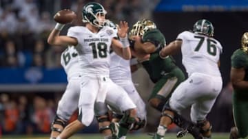 Jan 1, 2015; Arlington, TX, USA; Michigan State Spartans quarterback Connor Cook (18) passes against the Baylor Bears during the first half in the 2015 Cotton Bowl Classic at AT&T Stadium. Mandatory Credit: Jerome Miron-USA TODAY Sports