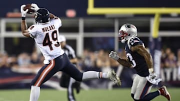 Aug 18, 2016; Foxborough, MA, USA; Chicago Bears tight end Tony Moeaki (49) makes a catch while being defended by New England Patriots strong safety Patrick Chung (23) during the first half at Gillette Stadium. Mandatory Credit: Bob DeChiara-USA TODAY Sports