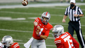 Nov 7, 2020; Columbus, Ohio, USA; Ohio State Buckeyes quarterback Justin Fields (1) throws during the first quarter against the Rutgers Scarlet Knights at Ohio Stadium. Mandatory Credit: Joseph Maiorana-USA TODAY Sports