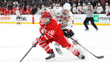 BOSTON, MASSACHUSETTS - FEBRUARY 10: Ryan Shea #5 of the Northeastern Huskies defends Max Willman #16 of the Boston University Terriers during the first period of the 2020 Beanpot Tournament Championship game between the Northeastern Huskies and the Boston University Terriers at TD Garden on February 10, 2020 in Boston, Massachusetts. (Photo by Maddie Meyer/Getty Images)