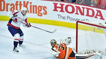 Mar 30, 2016; Philadelphia, PA, USA; Philadelphia Flyers goalie Steve Mason (35) makes a save against Washington Capitals center Evgeny Kuznetsov (92) during the shootout at Wells Fargo Center. The Flyers defeated the Capitals, 2-1 in a shootout. Mandatory Credit: Eric Hartline-USA TODAY Sports