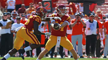 LOS ANGELES, CA - OCTOBER 07: Sam Darnold #14 hands of the ball to Ronald Jones II #25 of the USC Trojans against the Oregon State Beavers at Los Angeles Memorial Coliseum on October 7, 2017 in Los Angeles, California. (Photo by Leon Bennett/Getty Images)