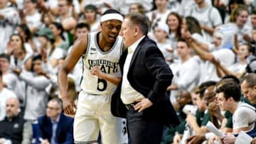 Michigan State basketball's Cassius Winston, left, talks with head coach Tom Izzo during the first half on Sunday, March 8, 2020, at the Breslin Center in East Lansing.200308 Msu Osu 044a