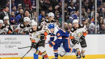 UNIONDALE, NY - JANUARY 20: Anaheim Ducks Center Carter Rowney (24) skates by New York Islanders Left Wing Michael Dal Colle (28) during the first period of a regular season NHL game between the Anaheim Ducks and the New York Islanders on January 20, 2019, at Nassau Veterans Memorial Coliseum in Uniondale, NY. (Photo by David Hahn/Icon Sportswire via Getty Images)