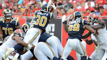 Sep 25, 2016; Tampa, FL, USA; Los Angeles Rams running back Todd Gurley (30) runs the ball in the second half against the Tampa Bay Buccaneer at Raymond James Stadium. Mandatory Credit: Jonathan Dyer-USA TODAY Sports