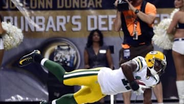 Aug 16, 2014; St. Louis, MO, USA; Green Bay Packers wide receiver Davante Adams (17) dives for extra yardage against the St. Louis Rams during the second half at Edward Jones Dome. Mandatory Credit: Scott Rovak-USA TODAY Sports