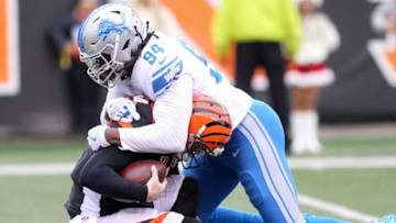 CINCINNATI, OH - DECEMBER 24: Ezekiel Ansah #94 of the Detroit Lions sacks Andy Dalton #14 of the Cincinnati Bengals during the first half at Paul Brown Stadium on December 24, 2017 in Cincinnati, Ohio. (Photo by John Grieshop/Getty Images)