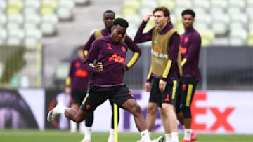 GDANSK, POLAND - MAY 25: Anthony Elanga of Manchester United takes a shot during the Manchester United Training Session ahead of the UEFA Europa League Final between Villarreal CF and Manchester United at Gdansk Arena on May 25, 2021 in Gdansk, Poland. (Photo by Maja Hitij/Getty Images)