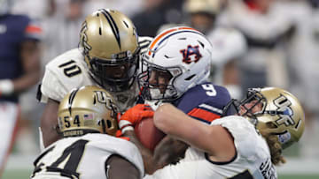College football analyst Jake Crain of "Crain & Company" believes the CFB gods will somehow set a UCF-Auburn football matchup up in a bowl game (Photo by Streeter Lecka/Getty Images)