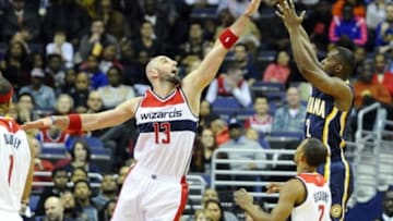 Nov 24, 2015; Washington, DC, USA; Indiana Pacers guard Rodney Stuckey (2) shoots as Washington Wizards center Marcin Gortat (13) defends during the first half at Verizon Center. Mandatory Credit: Brad Mills-USA TODAY Sports