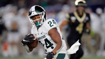 Elijah Collins, Michigan State football (Photo by Adam Hunger/Getty Images)