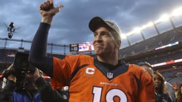 Jan 24, 2016; Denver, CO, USA; Denver Broncos quarterback Peyton Manning (18) gives a thumbs up to the fans after the AFC Championship football game at Sports Authority Field at Mile High. Denver Broncos defeated New England Patriots 20-18 to earn a trip to Super Bowl 50. Mandatory Credit: Chris Humphreys-USA TODAY Sports