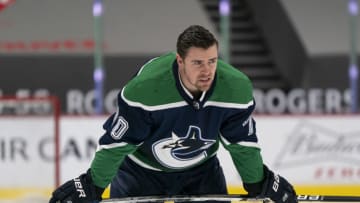 VANCOUVER, BC - FEBRUARY 19: Tanner Pearson #70 of the Vancouver Canucks during the pre-game warmup prior to NHL hockey action against the Winnipeg Jets at Rogers Arena on February 19, 2021 in Vancouver, Canada. (Photo by Rich Lam/Getty Images)