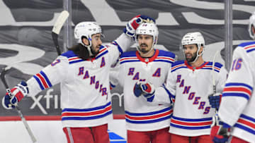 Feb 24, 2021; Philadelphia, Pennsylvania, USA; New York Rangers left wing Chris Kreider (20) celebrates his goal with center Mika Zibanejad (93) and center Colin Blackwell (43) against the Philadelphia Flyers during the first period at Wells Fargo Center. Mandatory Credit: Eric Hartline-USA TODAY Sports