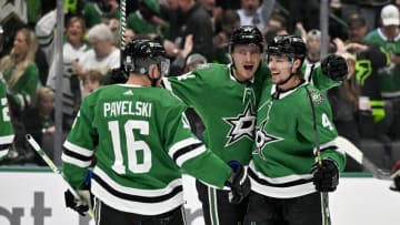 Nov 14, 2023; Dallas, Texas, USA; Dallas Stars center Joe Pavelski (16) and center Roope Hintz (24) and defenseman Miro Heiskanen (4) celebrates a power play goal scored by Hintz against the Arizona Coyotes during the second period at the American Airlines Center. Mandatory Credit: Jerome Miron-USA TODAY Sports