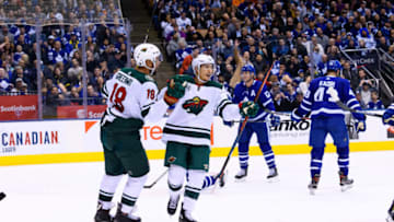 TORONTO, ON - JANUARY 03: Minnesota Wild Defenceman Jared Spurgeon (46) celebrates his goal with Minnesota Wild Winger Jordan Greenway (18) during the second period of the NHL regular season game between the Minnesota Wild and the Toronto Maple Leafs on January 3, 2019, at Scotiabank Arena in Toronto, ON, Canada. (Photo by Julian Avram/Icon Sportswire via Getty Images)