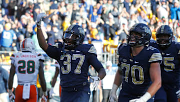 PITTSBURGH, PA - NOVEMBER 24: Qadree Ollison #37 of the Pittsburgh Panthers celebrates his 5 yard rushing touchdown in the second half on November 24, 2017 at Heinz Field in Pittsburgh, Pennsylvania. (Photo by Justin K. Aller/Getty Images)