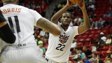 Jul 15, 2013; Las Vegas, NV, USA; Phoenix Suns guard Dionte Christmas (22) looks to pass the ball to Suns center Markieff Morris (11) during an NBA Summer League game against the Minnesota Timberwolves at the Thomas and Mack Center. Mandatory Credit: Stephen R. Sylvanie-USA TODAY Sports